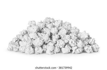 a large pile of crumpled paper isolated on white background. The concept of many incorrect ideas.
