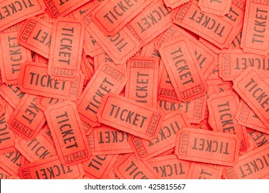 Large Pile Of Messy Red Tickets Scattered About.