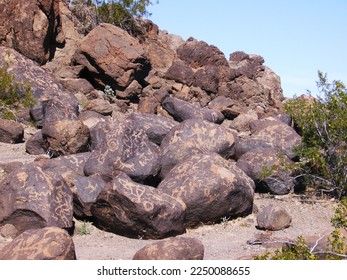 Large pile of rocks with petroglyphs at the Painted Rock Petroglyph Site in Arizona      