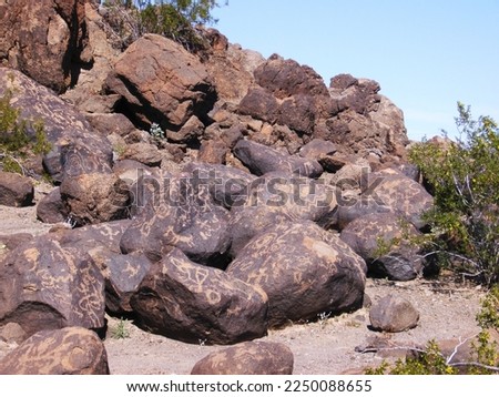 Large pile of rocks with petroglyphs at the Painted Rock Petroglyph Site in Arizona      