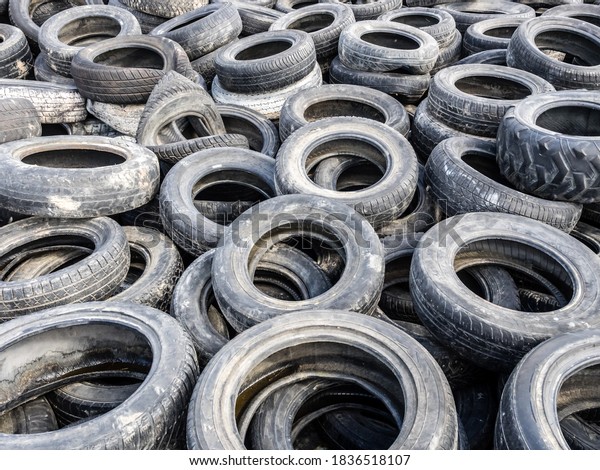 Large pile of\
tires dump, illegal garbage\
dump.
