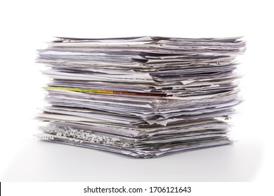 Large pile of waste paper isolated on white. Ready for recycling - Shutterstock ID 1706121643