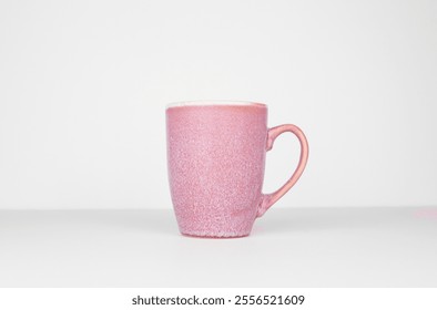 Grande taza rosa sobre