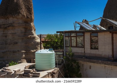 Large Plastic Water Storage Tank. A Water Tank On The Roof Of A House In Cappadocia. Water Conservation In Turkey