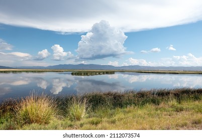 Large pond and unusual clouds in Bear Lake National Wildlife Refuge in Idaho - Shutterstock ID 2112073574