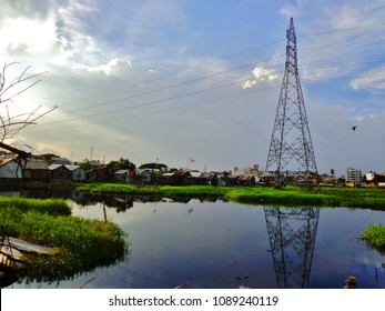 Large Power Lines above Village in Dhaka, Bangladesh 