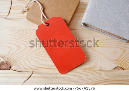 Large Price red Tag red tag on a golden wooden background