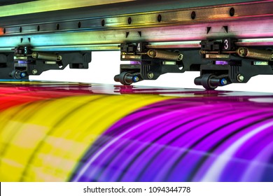 Large printer format inkjet working  - Shutterstock ID 1094344778