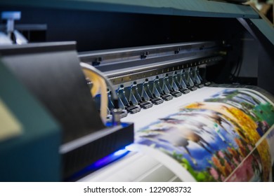 Large printer format inkjet working.