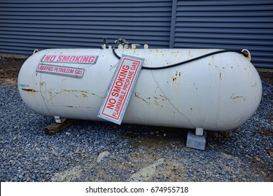 Large Propane Tank With Warning Sign