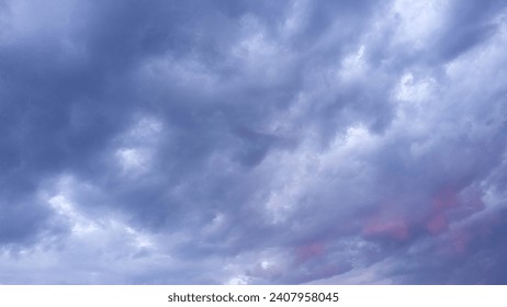 a large purple cloud in the sky
