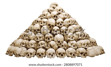 Large pyramid stack of human skulls arranged in a triangular pile