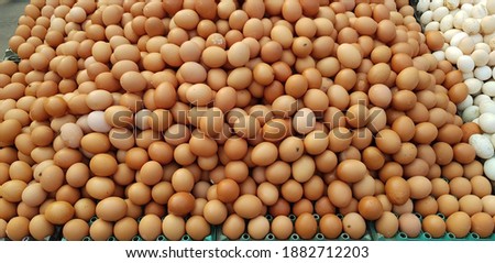 Large quantity eggs piled up on van rickshaw for sale.
