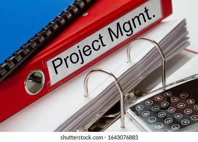 Large Red Folder For Project Management Including Blue Ring Binder And Pocket Calculator