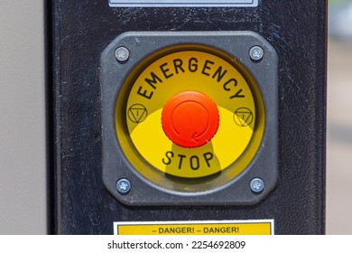 Large Red Push Button Emergency Stop at Construction Machine