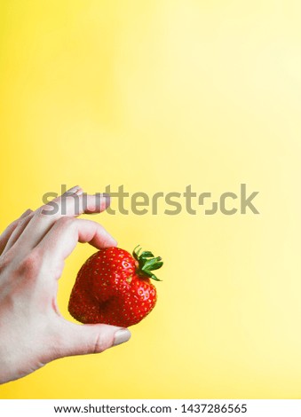 Similar – Woman holds strawberries in her hands