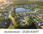 Large residential homes in southwest Florida gated community. American houses in rural US suburbs