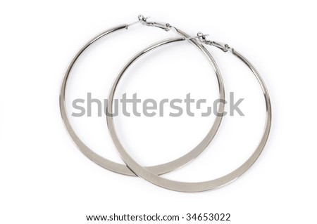 Large ring shaped earrings isolated on white background