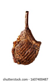 A Large Roasted Piece Of Mutton Steak, Pork, Veal Or Beef On Bones Cooked On An Air Fryer, In The Hands Of The Chef's Chief, A Isolated Image On A Black Background.