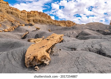 Large Rock Setting On Coal Mound In Front Of Mountain