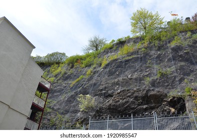 Large Rock Wall With Netting In Quebec, Canada