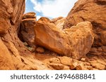 Large rocks are on the Fiery Furnace Trail in Arches National Park near Moab, Utah.