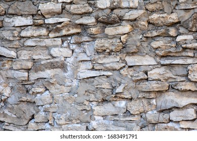 Large rough natural stone wall - texture for design