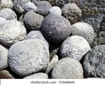 Large round stone cannon balls. Trebuchet ammunition.