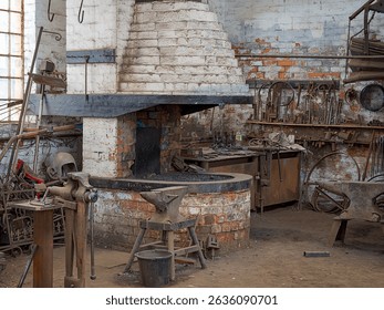 a large rustic blacksmith workshop with brick forge and vintage tools. - Powered by Shutterstock - Get 15% off with code: PIKWIZARD15