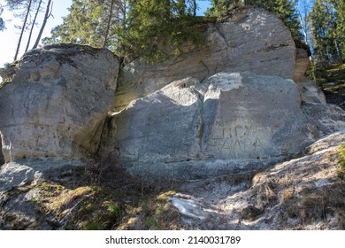 Large Sandstone Cliffs Of Sietiniezis On The Shore Of The River Gauja In Latvia. Tourist Nature Trail For Hiking With Wooden Stairs.