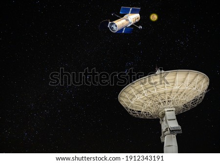 Large satellite dish receiver and satellite model in space with many shining star background ( concept idea technology communication )