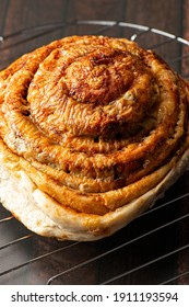 Large savoury scroll with melted cheese and Vegemite