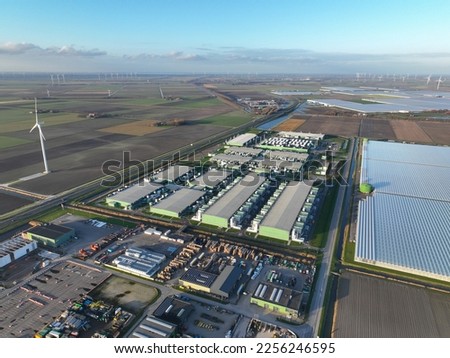 Large scale computing infrastructure, datacenter aerial drone overhead view. Telecommunication server infrastructure.