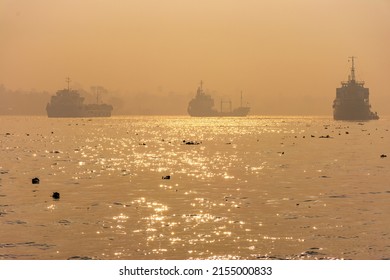 Large Sea, Ocean Carrier transport ships, vessels, in the fog, Morning in the Pashur River, Mongla Port in Bangladesh
