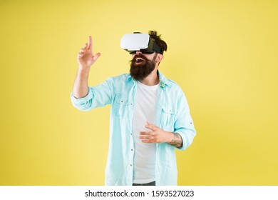 Large Selection Of Compatible Apps. Vr Concept. Buy Vr Device. Eye Tracking. Testing Software. Bearded Man Yellow Background Vr Glasses. Digital Future And Innovation. Developing Technologies.