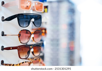 Large selection of multicolored sunglasses.