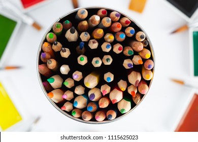 Large Set Of Colored Pencils Pointing Up - Top View