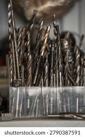 A large set of old drill bits in the workshop