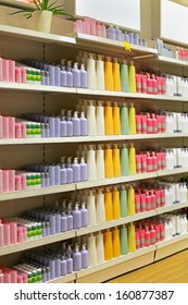 Large Shelf Inside Retail Cosmetic Store With Colorful Bottles