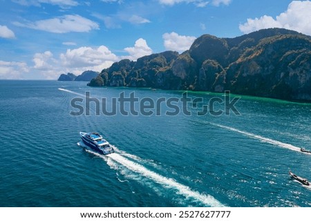 Large ship ferry from Phuket to Phi Phi, Krabi Thailand. Amazing travel landscape photo in Thai.