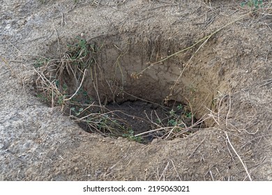 Large Sink Hole Open In Ground Danger