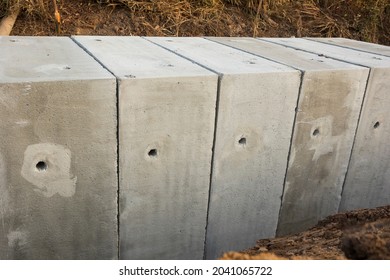 Large size square concrete manholes are installed at construction site ; for draining storm water of main road ; civil constrution background