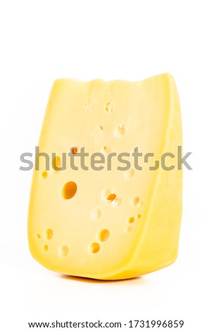 Large slice of semi soft part skim cheese on a white background.