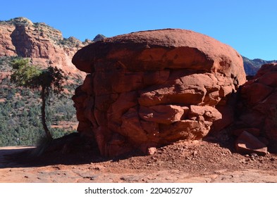 Large Smooth Red Rock Formation In Sedona Arizona On A Hike.