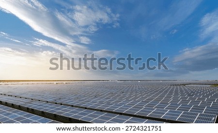 Large Solar Panel Installation Under Blue Sky