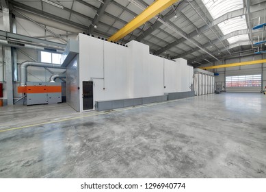Large, spacious and light factory workshop. Large spray booth inside the workshop.