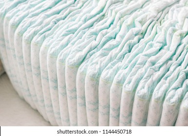 A Large Stack Of Baby Diapers, Close-ups, Diaper Packaging