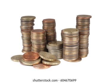 Large Stack Of Coins On A White Background