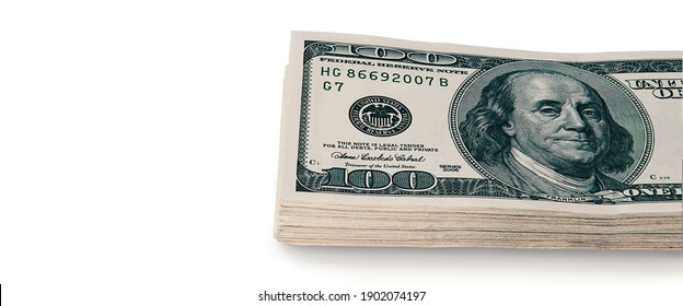 A Large Stack Of Hundred-dollar Cash Bills On A White Background. Isolated. Layout, Mockup, Place For Lettering And Logo.