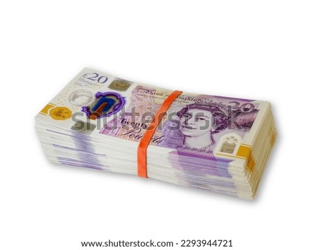 Large stack of money in the form of 20 British pound notes amounting to thousands in cash against a white cutout background